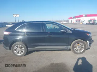 2016 Ford Edge SEL z VIN 2FMPK3J86GBC40141, wystawiony jako IAAI lot #41760168 z przebiegiem 142 413 mil mil oraz . Historia ofert i sprzedaży dostępna na DreamBid. Obrazek 14.