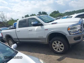 2020 Ram 2500 Laramie with VIN 3C6UR5FJ3LG141592, listed as a IAAI auction lot 42777818 with 194,980 mi miles and . Bid and sale history available at DreamBid. Image 13.