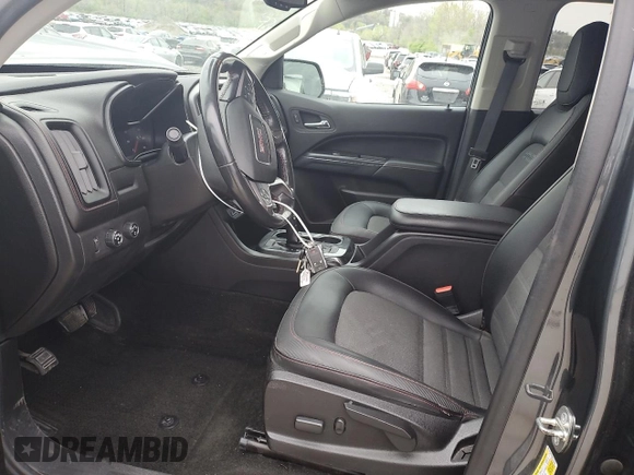 2016 GMC Canyon 4WD SLE with VIN 1GTG6CE36G1374456, listed as a Copart auction lot 52864115 with 63,892 mi miles and Salvage title. Bid and sale history available at DreamBid. Image 7.