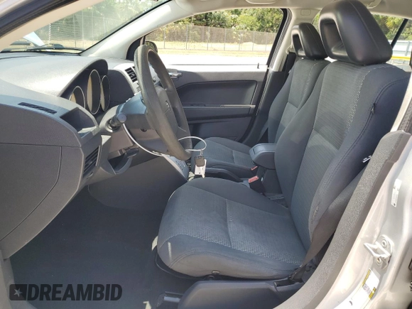 2009 Dodge Caliber SXT with VIN 1B3HB48A49D142621, listed as a Copart auction lot 55934095 with 158,885 mi miles and Non Repairable. Bid and sale history available at DreamBid. Image 7.