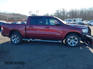 2019 Ram 1500 Big Horn/Lone Star with VIN 1C6SRFFT2KN647936, listed as a IAAI auction lot 41294403 with 123,834 mi miles. Bid and sale history available at carsss.com. Image 13.
