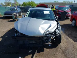 2018 Nissan Sentra S with VIN 3N1AB7AP1JY247296, listed as a IAAI auction lot 42099910 with 102,127 mi miles and . Bid and sale history available at DreamBid. Image 13.