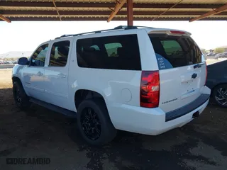 2012 Chevrolet Suburban LT with VIN 1GNSCJE05CR318556, listed as a IAAI auction lot 41654002 with 222,329 mi miles. Bid and sale history available at carsss.com. Image 3.