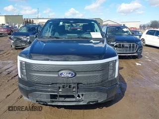 2024 Ford F-150 Lightning XLT z VIN 1FTVW3LK3RWG06339, wystawiony jako IAAI lot #41664763 z przebiegiem 9 891 mil mil oraz . Historia ofert i sprzedaży dostępna na DreamBid. Obrazek 12.