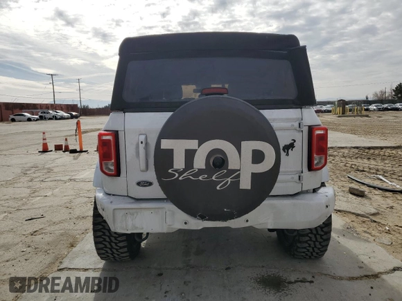 2021 Ford Bronco with VIN 1FMEE5BH5MLB03650, listed as a Copart auction lot 43584385 with 12,104 mi miles and Salvage Title. Bid and sale history available at DreamBid. Image 6.