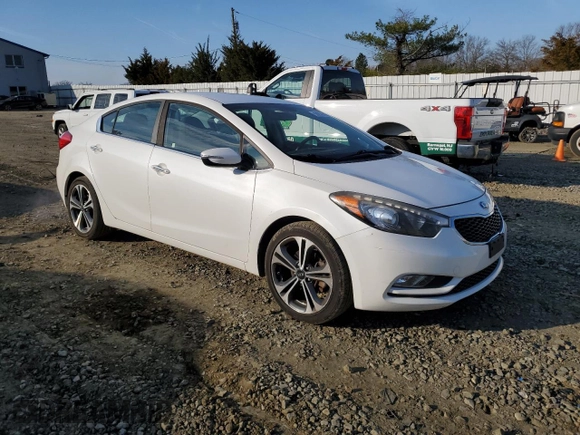 2016 Kia Forte EX with VIN KNAFX4A80G5502308, listed as a Copart auction lot 50939165 with 118,871 mi miles and Clean Title. Bid and sale history available at carsss.com. Image 4.