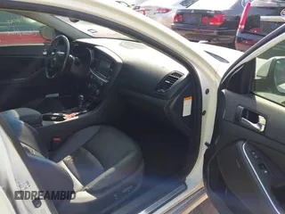 2015 Kia Optima EX with VIN KNAGN4AD6F5091809, listed as a IAAI auction lot 42257458 with 104,819 mi miles and . Bid and sale history available at DreamBid. Image 5.