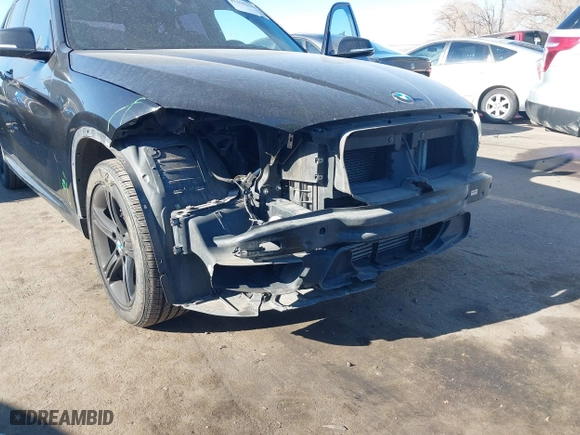 2014 BMW X1 xDrive28i with VIN WBAVL1C58EVY11143, listed as a IAAI auction lot 41396236 with 115,667 mi miles. Bid and sale history available at carsss.com. Image 6.