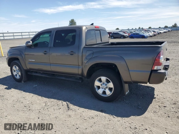 2014 Toyota Tacoma with VIN 3TMLU4EN7EM141763, listed as a Copart auction lot 59393505 with 50,177 mi miles and Salvage title. Bid and sale history available at DreamBid. Image 2.