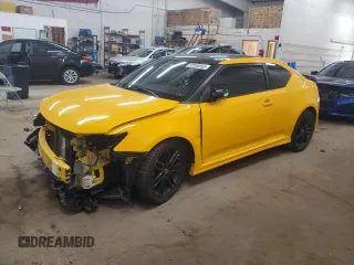 2012 Scion tC z VIN JTKJF5C7XC3026125, wystawiony jako Copart lot #58556095 z przebiegiem 119 494 mil mil oraz Szkoda całkowita • Salvage title. Historia ofert i sprzedaży dostępna na DreamBid. Obrazek 1.