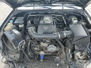 2007 Nissan Frontier SE z VIN 1N6AD09U57C437268, wystawiony jako Copart lot #49835405 z przebiegiem 145 232 mil mil oraz Szkoda całkowita • Salvage title. Historia ofert i sprzedaży dostępna na DreamBid. Obrazek 11.