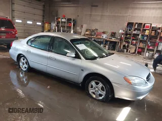 2000 Ford Taurus SEL z VIN 1FAFP56S7YG288636, wystawiony jako IAAI lot #42039592 z przebiegiem 134 408 mil mil oraz . Historia ofert i sprzedaży dostępna na DreamBid. Obrazek 1.