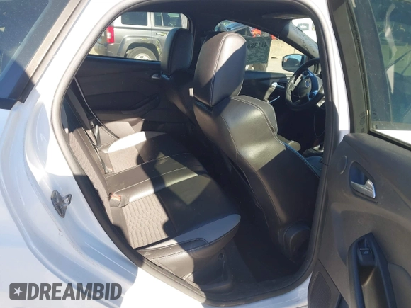 2014 Ford Focus ST with VIN 1FADP3L98EL308831, listed as a IAAI auction lot 41138622 with 133,317 mi miles and . Bid and sale history available at carsss.com. Image 8.
