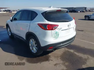 2014 Mazda CX-5 Grand Touring with VIN JM3KE4DY4E0375809, listed as a IAAI auction lot 41468078 with 151,226 mi miles. Bid and sale history available at carsss.com. Image 3.