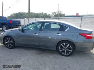 2016 Nissan Altima 2.5 SL with VIN 1N4AL3APXGC246190, listed as a IAAI auction lot 41452833 with 120,789 mi miles. Bid and sale history available at carsss.com. Image 14.