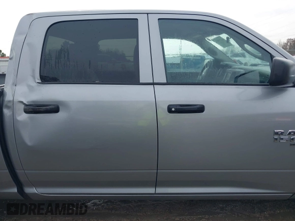 2023 Ram 1500 Classic Tradesman with VIN 3C6RR6KGXPG656150, listed as a IAAI auction lot 41346453 with 57,147 mi miles. Bid and sale history available at carsss.com. Image 14.