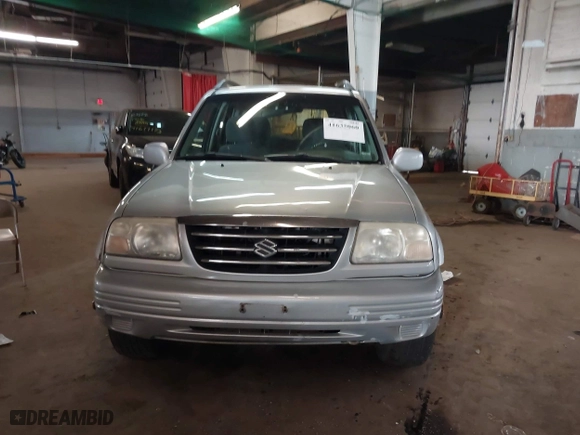 2000 Suzuki Grand Vitara JLX with VIN JS3TD62V1Y4101244, listed as a IAAI auction lot 41635060 with 169,951 mi miles. Bid and sale history available at carsss.com. Image 12.
