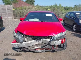 2014 Honda Civic Si with VIN 2HGFB6E55EH705800, listed as a IAAI auction lot 42470494 with 129,067 mi miles and . Bid and sale history available at DreamBid. Image 12.