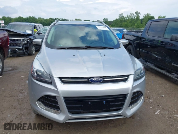 2016 Ford Escape Titanium with VIN 1FMCU9J95GUB93585, listed as a IAAI auction lot 42614106 with 124,465 mi miles and . Bid and sale history available at DreamBid. Image 12.