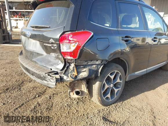 2015 Subaru Forester 2.0XT Touring with VIN JF2SJGUC0FH516972, listed as a IAAI auction lot 41483033 with 103,970 mi miles. Bid and sale history available at carsss.com. Image 6.