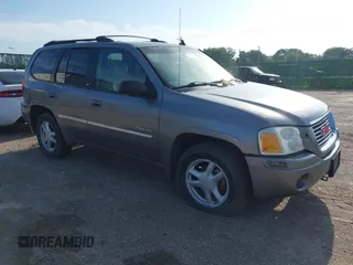 2006 GMC Envoy SLT with VIN 1GKDT13S362346878, listed as a IAAI auction lot 42795058 with 157,420 mi miles and . Bid and sale history available at DreamBid. Image 1.