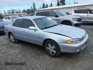 1996 Toyota Camry DX with VIN JT2BG12K2T0396941, listed as a IAAI auction lot 41593032 with 205,514 mi miles. Bid and sale history available at carsss.com. Image 13.
