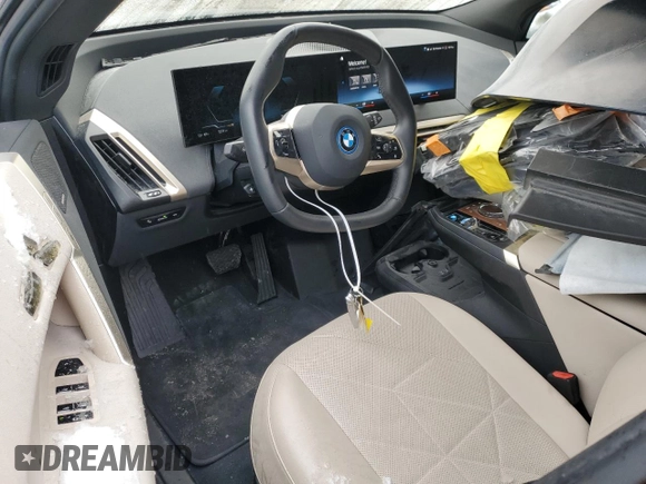 2023 BMW iX xDrive50 with VIN WB523CF02PCM42677, listed as a Copart auction lot 83855194 with 17,025 mi miles and Salvage Title. Bid and sale history available at carsss.com. Image 8.