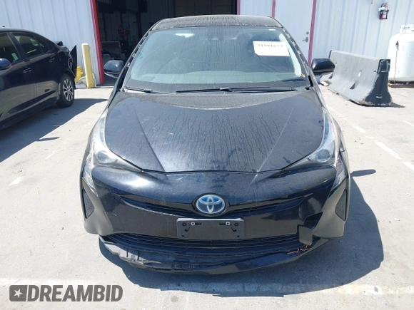 2017 Toyota Prius Two with VIN JTDKBRFU1H3036243, listed as a IAAI auction lot 41991623 with 88,626 mi miles. Bid and sale history available at carsss.com. Image 12.