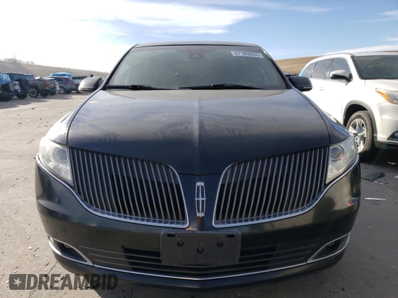 2015 Lincoln MKT with VIN 2LMHJ5NK0FBL03357, listed as a Copart auction lot 87189024 with 228,046 mi miles and Salvage Title. Bid and sale history available at carsss.com. Image 5.