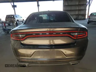 2019 Dodge Charger SXT z VIN 2C3CDXBG0KH711690, wystawiony jako Copart lot #57724225 z przebiegiem 114 464 mil mil oraz Szkoda całkowita • Salvage title. Historia ofert i sprzedaży dostępna na DreamBid. Obrazek 6.