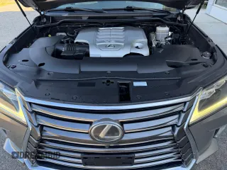2016 Lexus LX 570 with VIN JTJHY7AX4G4198811, listed as a Copart auction lot 64898475 with 107,759 mi miles and Clean title. Bid and sale history available at DreamBid. Image 7.