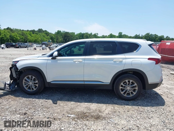 2019 Hyundai Santa Fe SE with VIN 5NMS23AD0KH013811, listed as a IAAI auction lot 42337926 with 87,000 mi miles and . Bid and sale history available at DreamBid. Image 14.