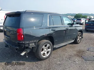 2016 Chevrolet Tahoe LT with VIN 1GNSKBKC4GR288608, listed as a IAAI auction lot 42469898 with 128,364 mi miles and . Bid and sale history available at DreamBid. Image 4.