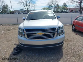 2020 Chevrolet Suburban Premier with VIN 1GNSCJKCXLR219679, listed as a IAAI auction lot 41806579 with 90,132 mi miles. Bid and sale history available at carsss.com. Image 12.
