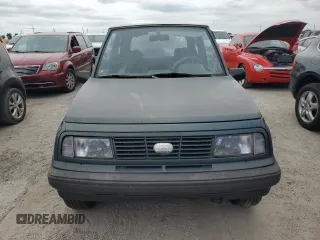 1994 Geo Tracker z VIN 2CNBE18U1R6918878, wystawiony jako Copart lot #75894834 z przebiegiem Nie podano mil oraz Nie do naprawy. Historia ofert i sprzedaży dostępna na DreamBid. Obrazek 5.