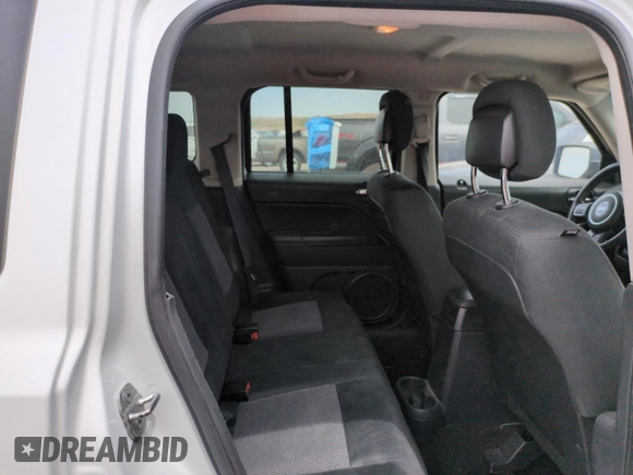 2014 Jeep Patriot Latitude с VIN 1C4NJRFB0ED760056, выставлен на аукционе Copart как лот 58931465 с пробегом 192 469 миль миль и Списание • Salvage title. История ставок и продаж доступна на DreamBid. Изображение 10.