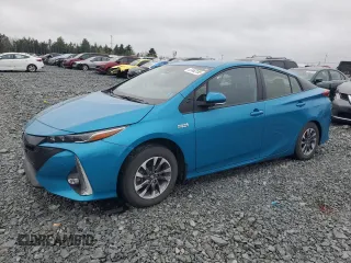 2022 Toyota Prius LE z VIN JTDKAMFP8N3209168, wystawiony jako Copart lot #57463185 z przebiegiem 66 262 mil mil oraz Szkoda całkowita • Salvage title. Historia ofert i sprzedaży dostępna na DreamBid. Obrazek 1.