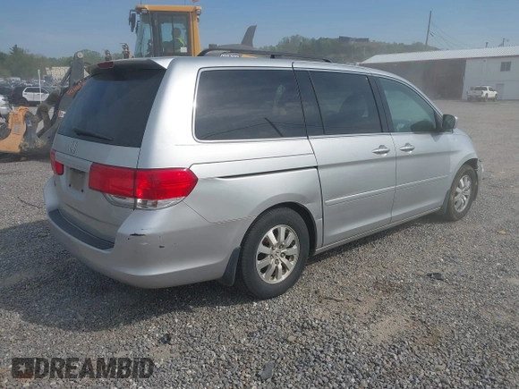 2010 Honda Odyssey EX with VIN 5FNRL3H43AB025629, listed as a IAAI auction lot 42095744 with 209,722 mi miles and . Bid and sale history available at DreamBid. Image 4.