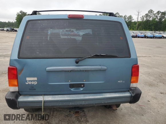 1999 Jeep Cherokee Sport с VIN 1J4FT68S9XL552299, выставлен на аукционе Copart как лот 58045135 с пробегом Не указан миль и Списание • Salvage title. История ставок и продаж доступна на DreamBid. Изображение 6.