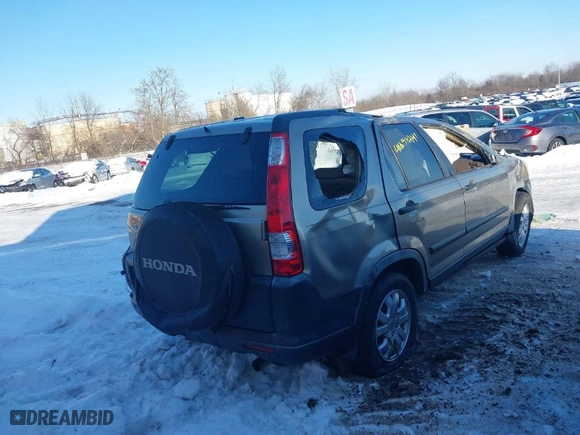 2006 Honda CR-V EX with VIN JHLRD68806C017948, listed as a IAAI auction lot 41258241 with 212,799 mi miles. Bid and sale history available at carsss.com. Image 4.