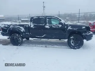 2011 Toyota Tacoma with VIN 3TMMU4FN8BM025440, listed as a IAAI auction lot 41246630 with 137,341 mi miles and . Bid and sale history available at DreamBid. Image 13.