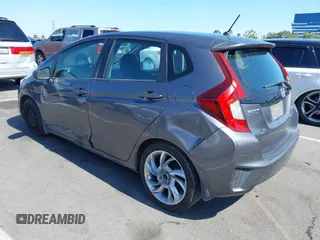 2015 Honda Fit LX with VIN 3HGGK5G54FM731965, listed as a IAAI auction lot 42655355 with 141,205 mi miles and . Bid and sale history available at DreamBid. Image 3.