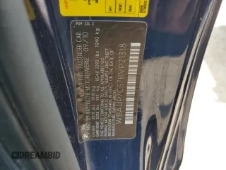 2011 BMW 1 Series 128i with VIN WBAUP7C57BVP21318, listed as a Copart auction lot 60479055 with 102,151 mi miles and Salvage title. Bid and sale history available at DreamBid. Image 12.