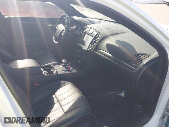 2014 Chrysler 300 S with VIN 2C3CCABG0EH235784, listed as a IAAI auction lot 41345692 with 109,920 mi miles and . Bid and sale history available at DreamBid. Image 5.