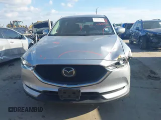 2020 Mazda CX-5 Touring with VIN JM3KFACMXL1786200, listed as a IAAI auction lot 41506139 with 121,944 mi miles. Bid and sale history available at carsss.com. Image 6.