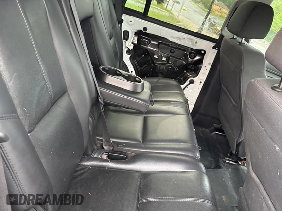 2019 Chevrolet Tahoe Commercial with VIN 1GNLCDECXKR281986, listed as a Copart auction lot 63148895 with 103,693 mi miles and Clean title. Bid and sale history available at DreamBid. Image 6.