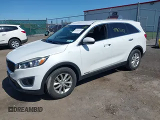 2016 Kia Sorento LX with VIN 5XYPGDA55GG081559, listed as a IAAI auction lot 41965683 with 94,177 mi miles. Bid and sale history available at carsss.com. Image 17.