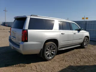 2017 Chevrolet Suburban Premier with VIN 1GNSKJKC4HR316953, listed as a Copart auction lot 76944884 with 105,753 mi miles and Salvage Title. Bid and sale history available at DreamBid. Image 3.