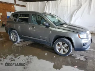 2014 Jeep Compass Sport with VIN 1C4NJDBB6ED592223, listed as a Copart auction lot 63343984 with 124,942 mi miles and Clean Title. Bid and sale history available at carsss.com. Image 4.