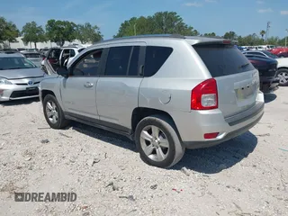 2012 Jeep Compass Sport with VIN 1C4NJCBA7CD660091, listed as a IAAI auction lot 42113038 with 123,181 mi miles. Bid and sale history available at carsss.com. Image 3.